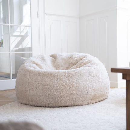 Rund saueskinnspose i kort ull | Medium | Large Koksgrå