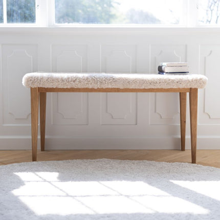 Kort ullteppe i krøllete saueskinndesign Ø140 cm Beige