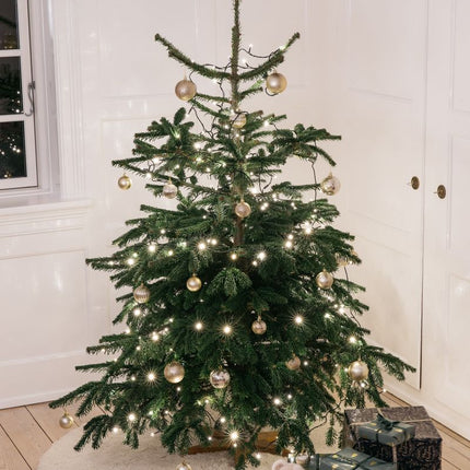 Kort ullteppe i krøllete saueskinndesign Ø140 cm Beige