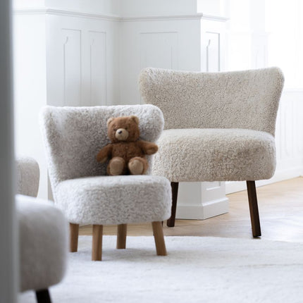 Kort ullteppe i krøllete saueskinndesign Ø140 cm Beige